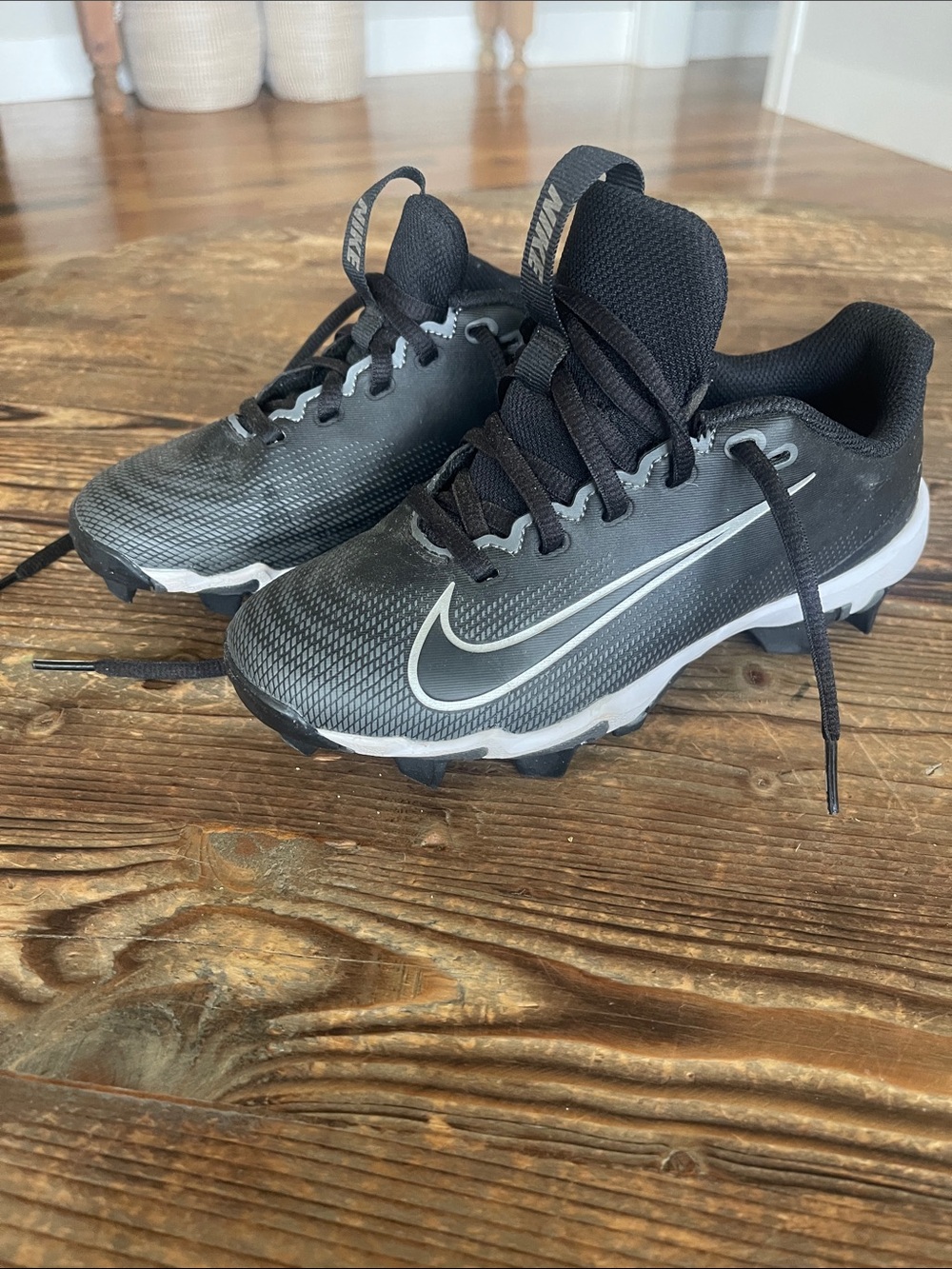 Nike Black Cleats with Gray and Silver Swoosh